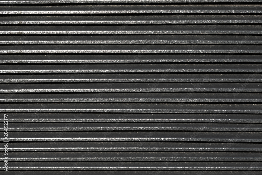 Flatlay of ribbed metal surface Flatlay of ribbed metal surface
