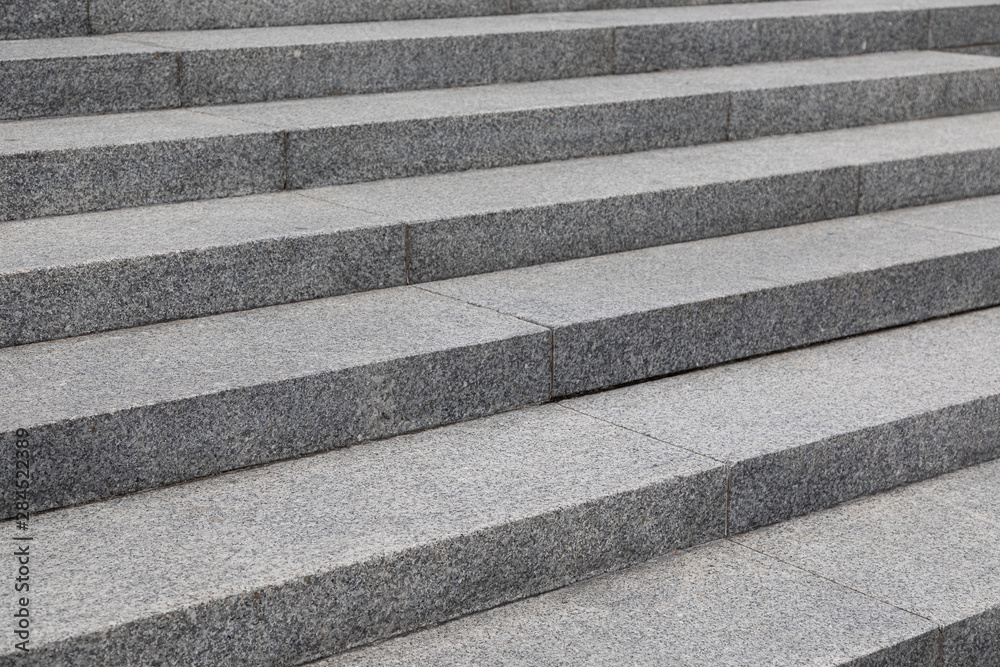 Grey cobblestone planch steps, background with grunge texture Grey cobblestone planch steps, background with grunge texture