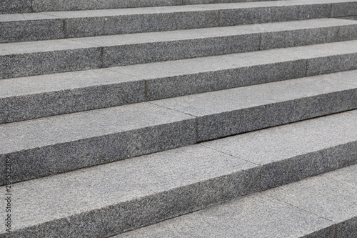 Grey cobblestone planch steps, background with grunge texture