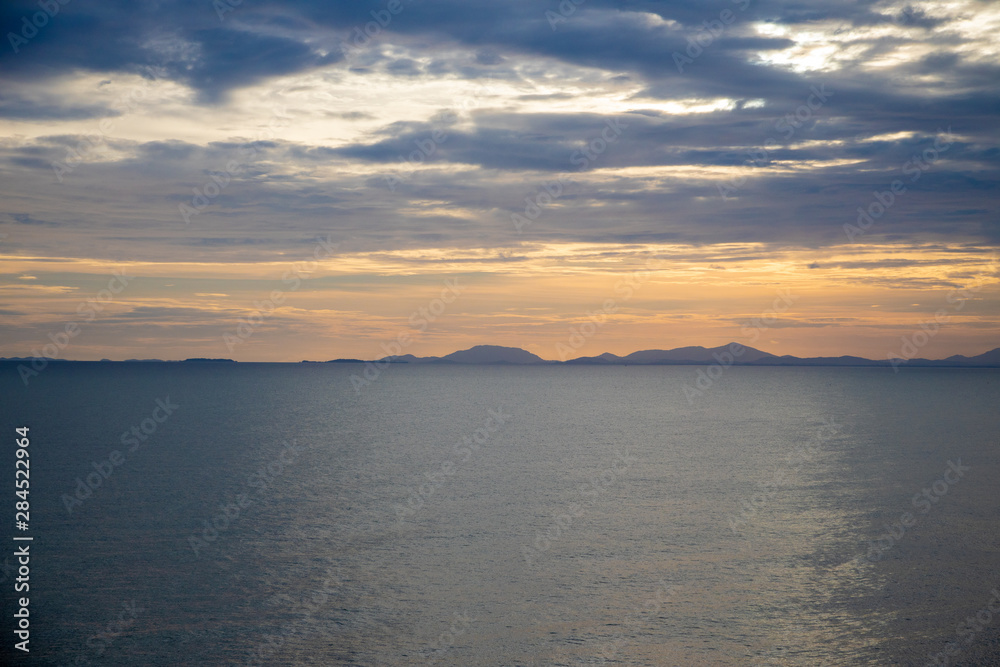 Sunset sea and mountain