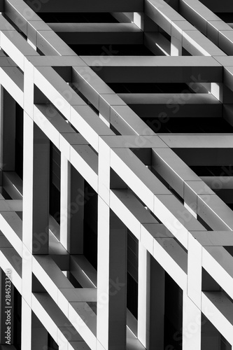 Close-up view of modern building facade with strong black and white patterns