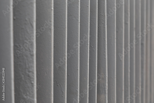 Metal bars of balustrade  background with grunge texture