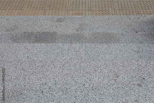 Gray granite tile with tactile paving