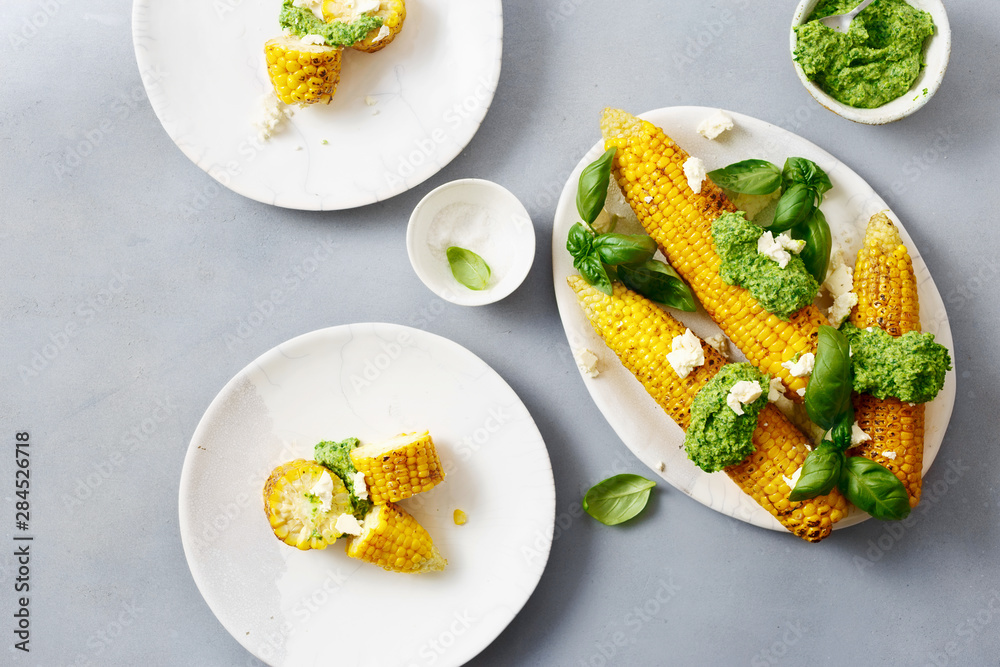 grilled sweet corn with pesto top view