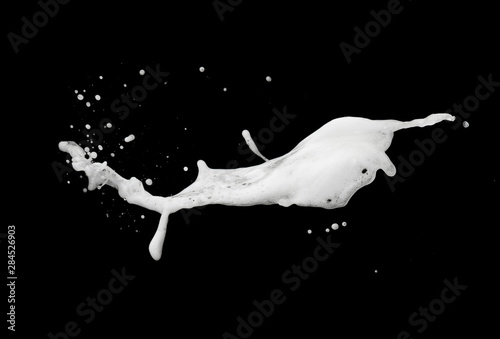 White foam bubble soap shampoo splash explosion in the air on black background,freeze stop motion photo object design photo