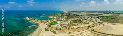 Aerial view of the ruins of the Roman Amphitheater in the sand dunes of the ancient city of Caesarea Maritima built by Herod the Great 