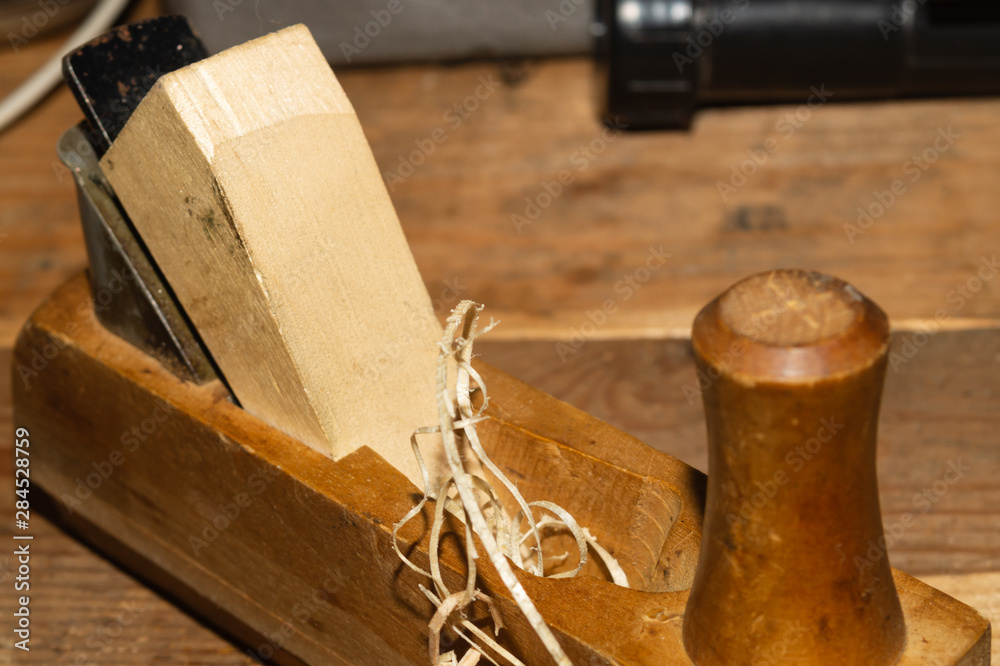 Carpentry plane. jointer close up. woodworking and crafting tools. hand tools. working instrument Carpentry plane. jointer close up. woodworking and crafting tools. hand tools. working instrument