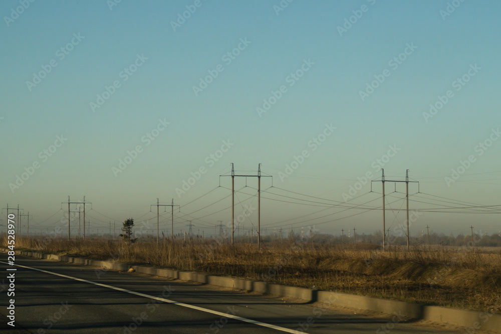 Power line posts. high voltage tower on the sky background