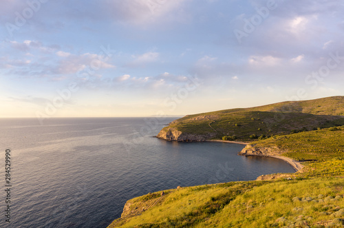 Amazing scenery by the sea in Agios Efstratios island, in the dusk photo