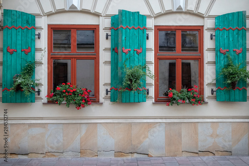 Postcard of a building with beautiful windows in Europe