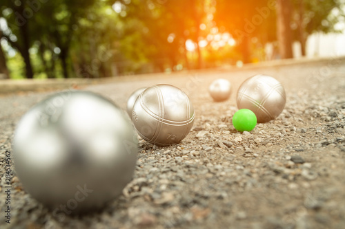 Petanque balls in the playing field.