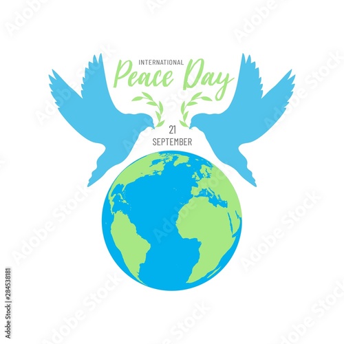 International peace day with doves, olive branches and earth