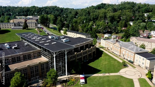 Aerial view pushing in on the Falcon Center on the Fairmont State University campus in Fairmont, WV. photo