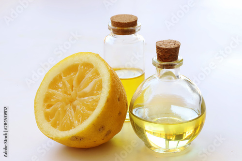 Cut lemons and lemon oil in the bottle
