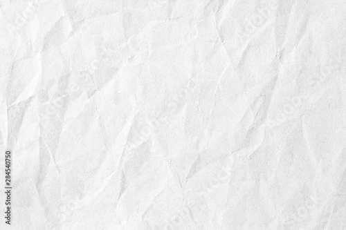 Crumpled white grey paper texture