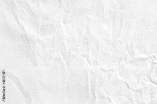 Crumpled white grey paper texture