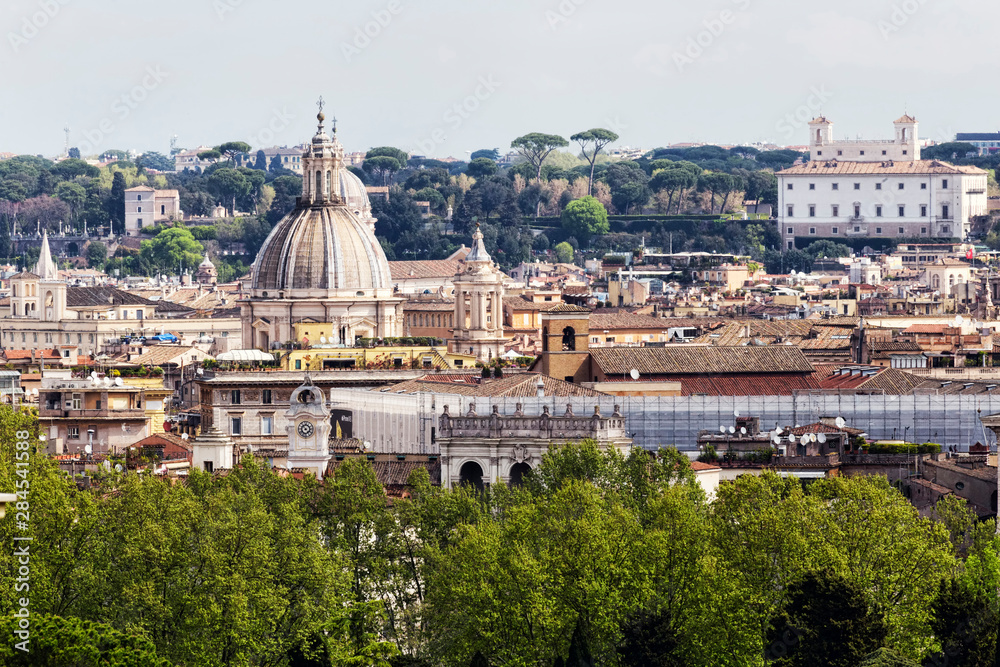 Rome's glimpse with a beautiful dome surrounded by ancient buildings and monuments