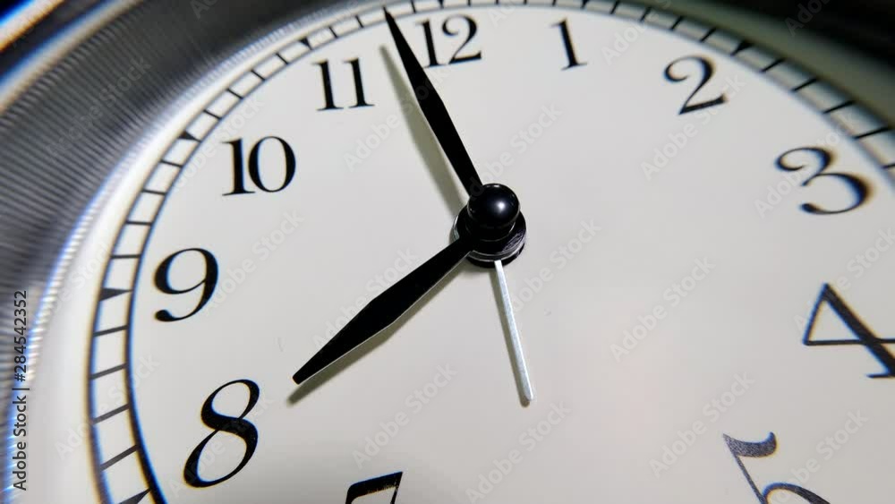 The Clock With Black Arrows Shows The Time Eight Hours Timelapse. The Clock With Black Arrows Shows The Time Eight Hours Timelapse.