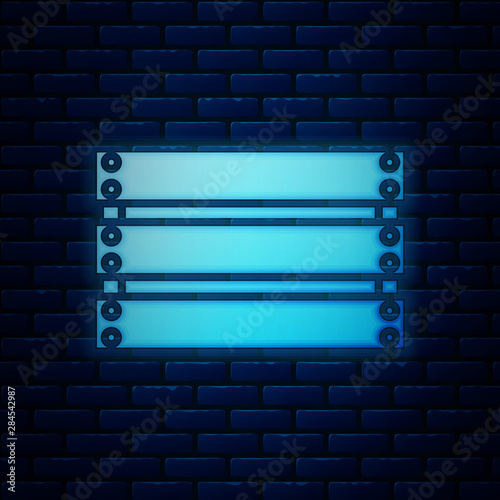 Glowing neon Wooden box icon isolated on brick wall background. Grocery basket, storehouse crate. Empty wooden container for vegetables, products. Vector Illustration