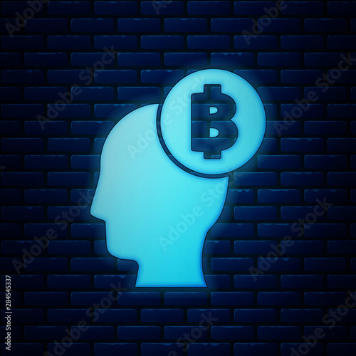 Glowing neon Bitcoin think icon isolated on brick wall background. Cryptocurrency head. Blockchain technology, digital money market, cryptocoin wallet. Vector Illustration