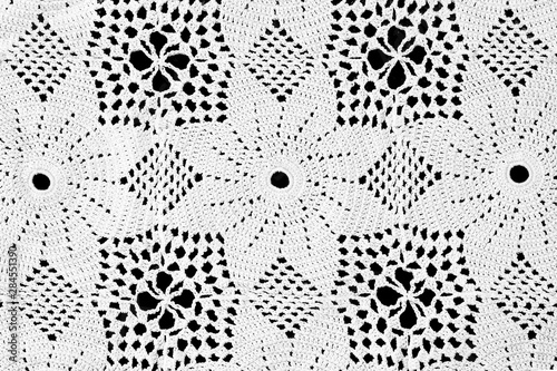 Top view of crochet lace doily tablecloth photo