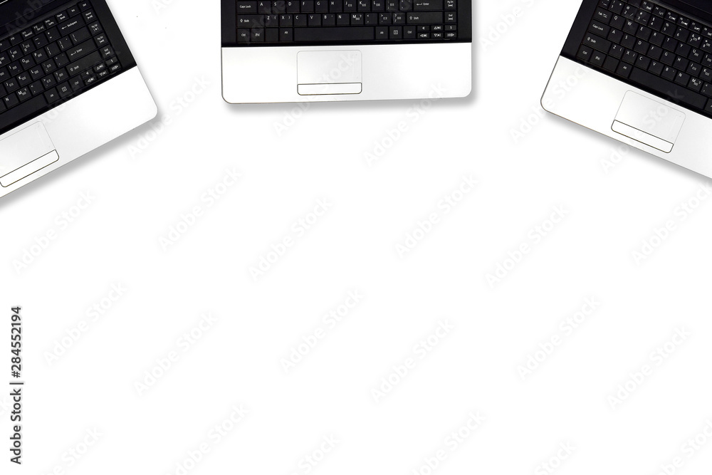 The laptop is on a white background with the copy space, Top view The laptop is on a white background with the copy space, Top view