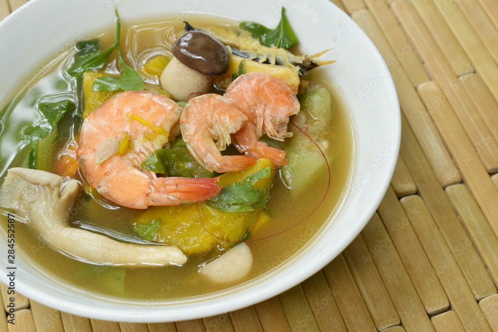 boiled spicy mixed vegetable with shrimp and smoked dry fish soup on bowl boiled spicy mixed vegetable with shrimp and smoked dry fish soup on bowl