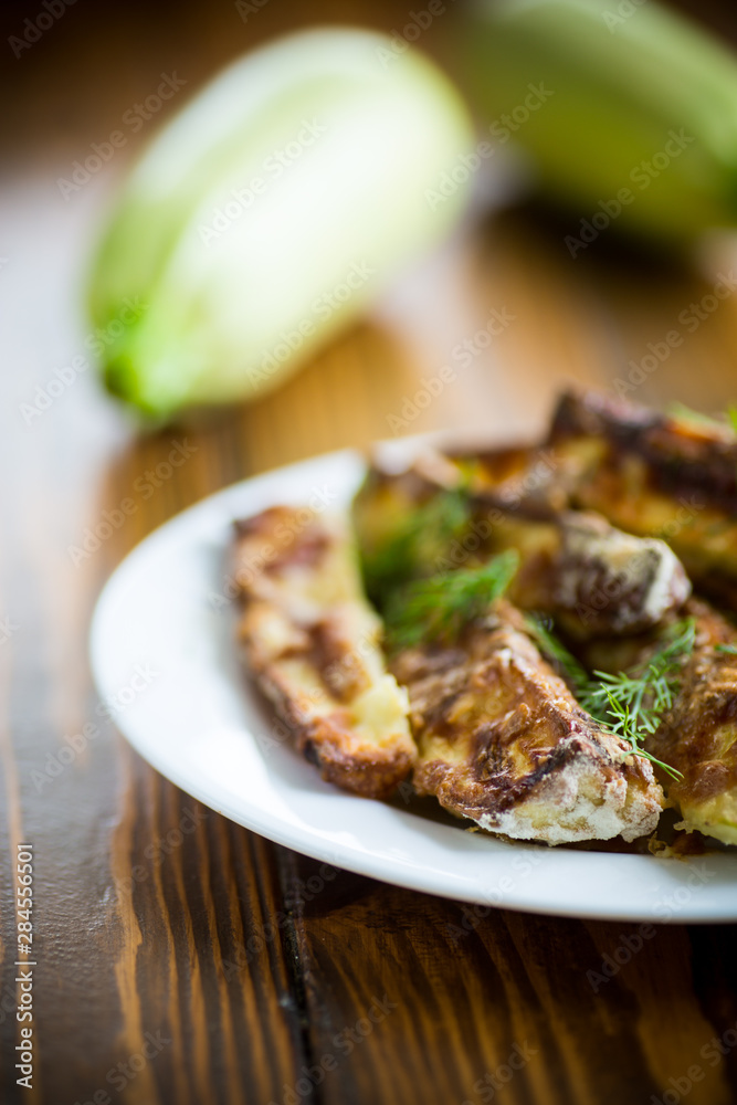 oven-baked zucchini in batter with garlic and herbs oven-baked zucchini in batter with garlic and herbs