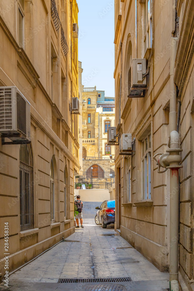 Narrow street with air conditioning in the southern city