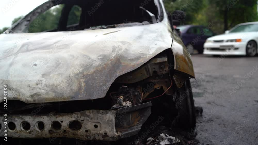 Vandalism or revenge, burnt car. The consequences of popular protest, burnt car, a crime. Car after fire. Auto trash Vandalism or revenge, burnt car. The consequences of popular protest, burnt car, a crime. Car after fire. Auto trash