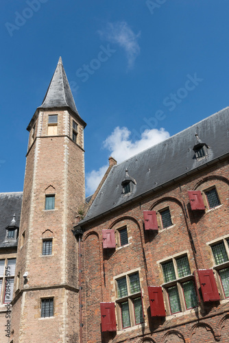 Historical building with tower and shutters. Abbey of Middelburg, The Netherlands