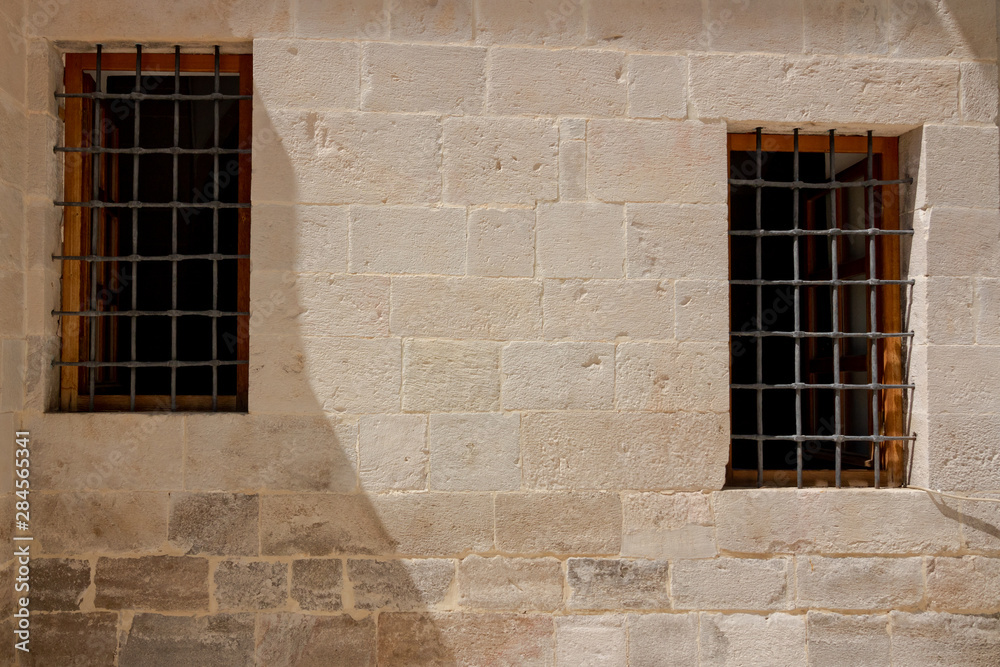 windows on the stone wall