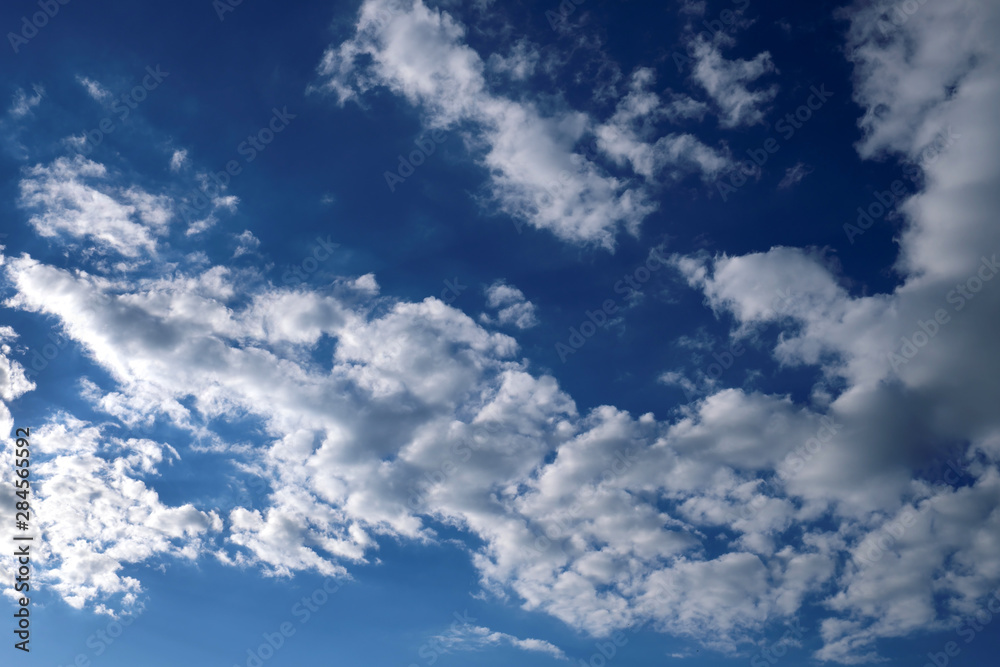 Fototapeta premium White clouds and blue sky - Stockphoto