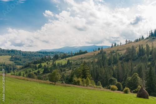 Beautiful mountain landscape against the blue sky and clouds