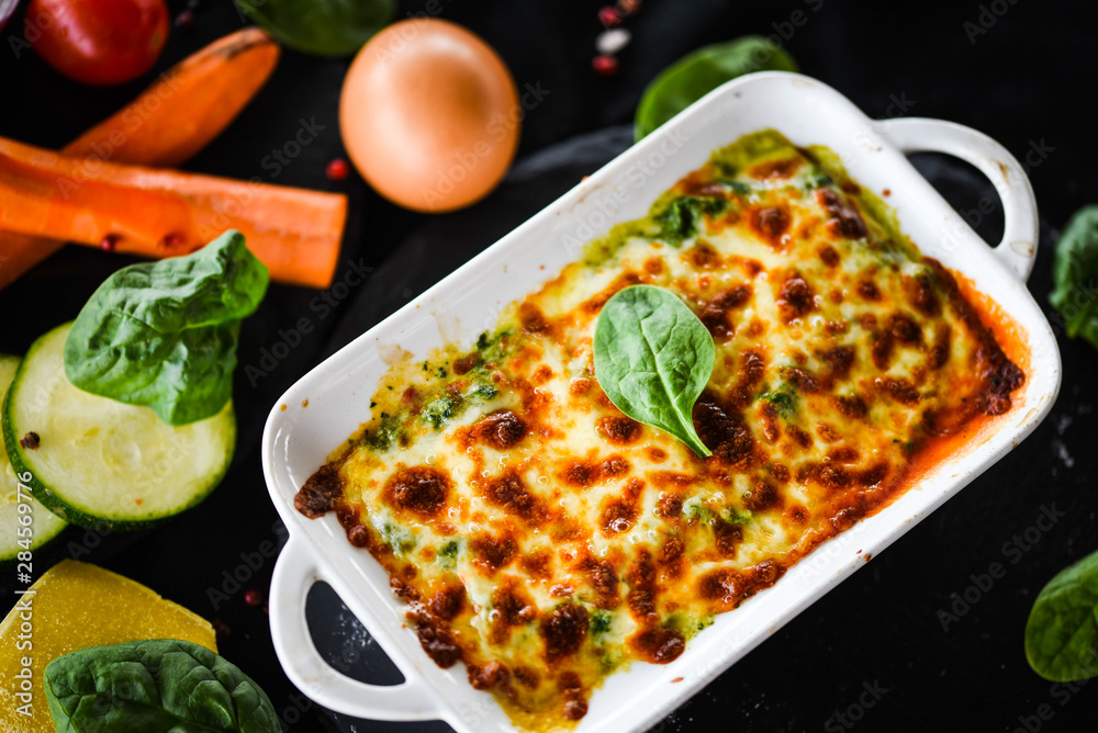 spinach lasagna with fresh vegetables