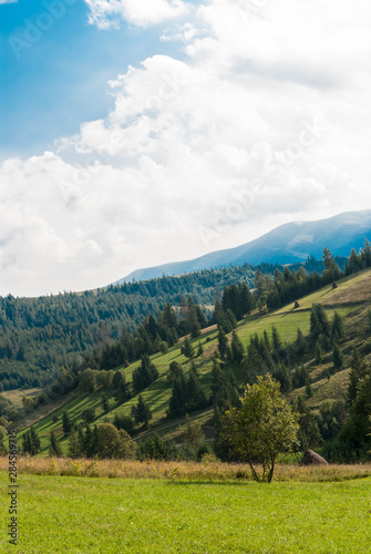 Beautiful mountain landscape against the blue sky and clouds