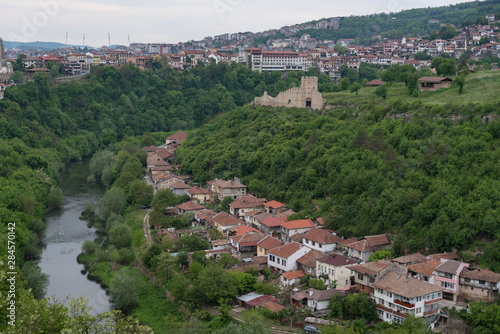 Panoramic view of Veliko Tarnovo old town, Yantra river and View to tower and Trapezitsa fortress. Bulgaria