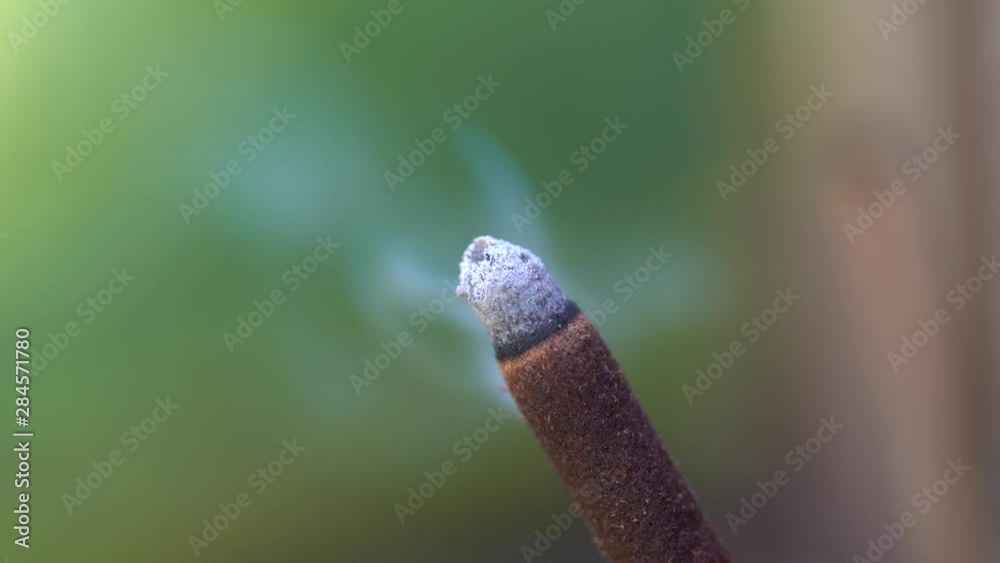 Incense stick burning with smoke, close up . Island Bali, Ubud, Indonesia Incense stick burning with smoke, close up . Island Bali, Ubud, Indonesia