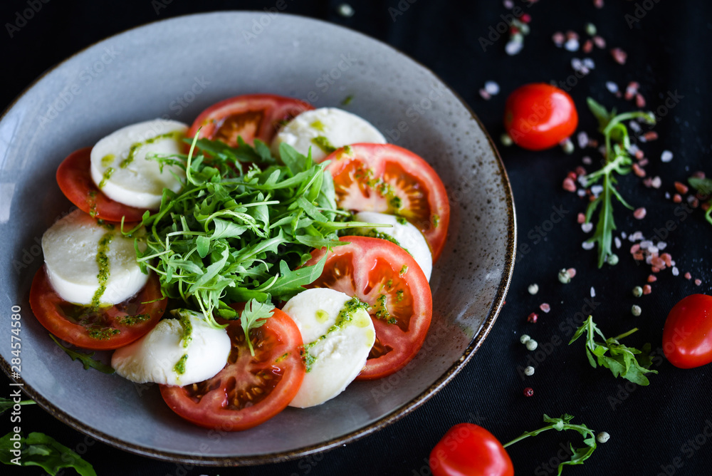 italian caprese salad with fresh mozzarella, tomatoes & basil italian caprese salad with fresh mozzarella, tomatoes & basil