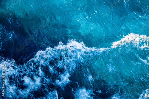 Seething Mediterranean sea water, top view in the open sea photo