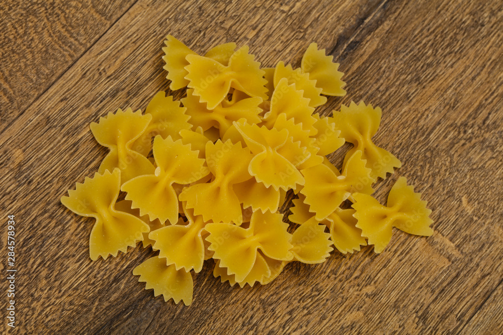 Raw dry farfalle pasta for cooking Raw dry farfalle pasta for cooking