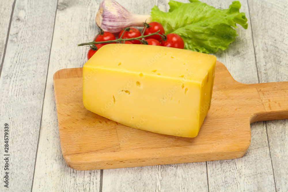 Hard yellow tasty cheese brick Hard yellow tasty cheese brick