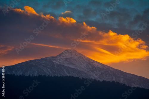Amazing sunset with orange clouds at Teide National Park in Tenerife Canary Islands Spain
