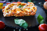 italian lasagna slice with fresh ingredients