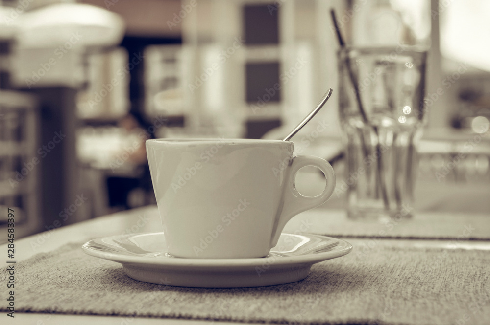 cup with coffee on the table cup with coffee on the table