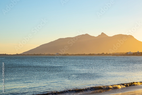 sunset at boca da barra beach, in rio das ostras, rio de janeiro, brazil
