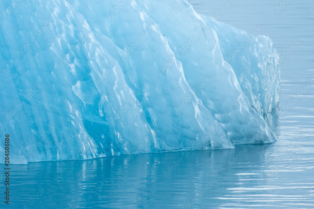 Closeup view of iceberg surface melting in glacier lagoon