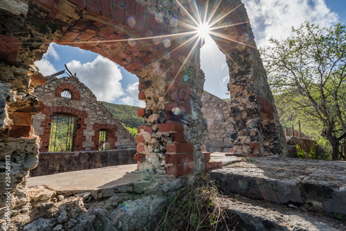 An old ruined hstoric store house onthe island of Curacao photo