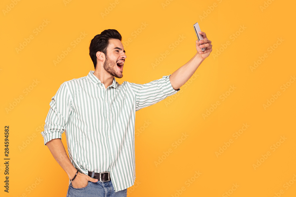 Handsome man using mobile phone. Handsome man using mobile phone.