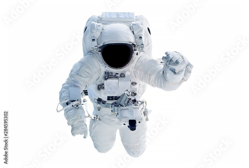 The astronaut in a space suit, waves a hand, isolated on a white background. Elements of this image were furnished by NASA